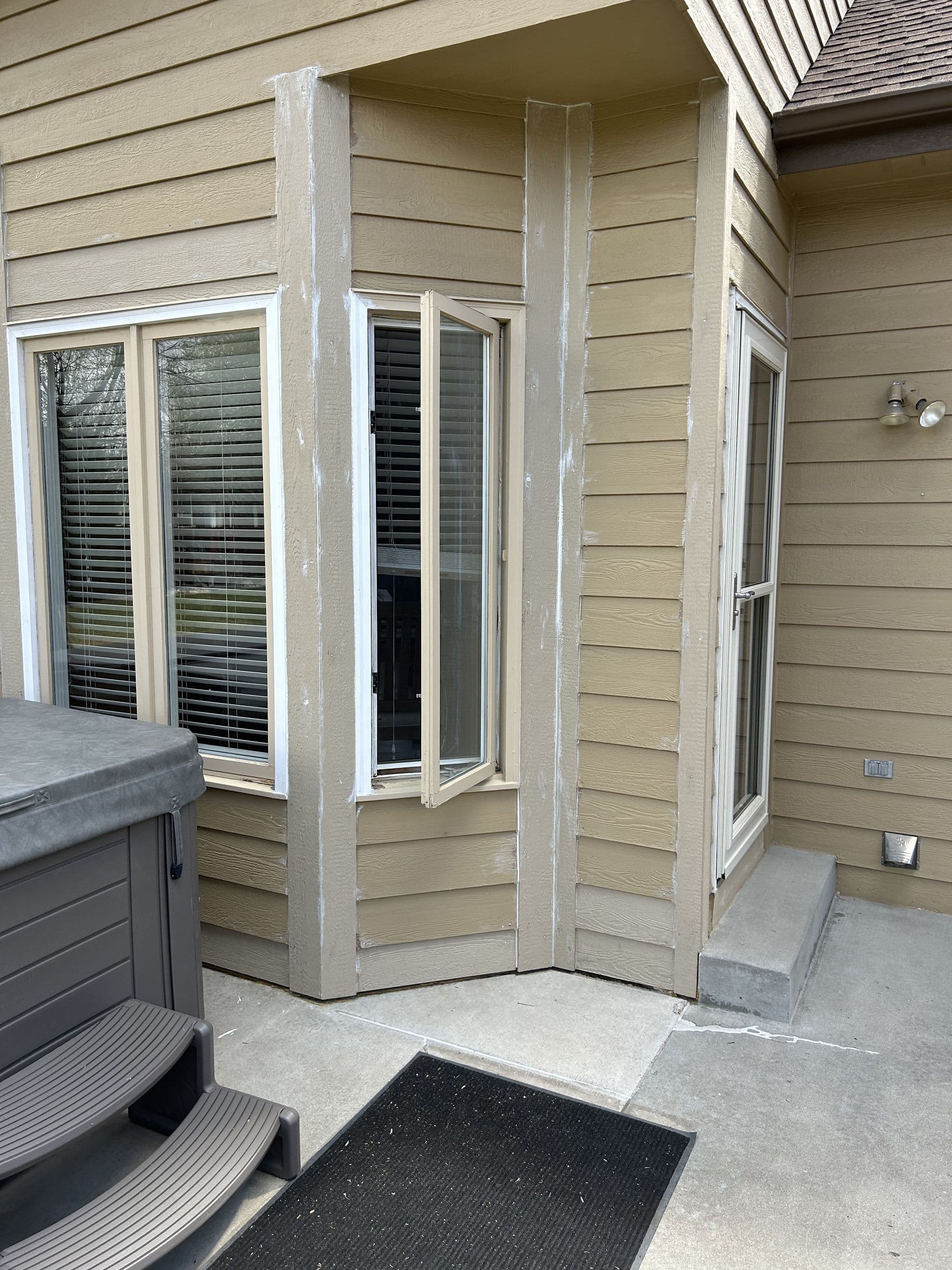 Finished siding around a bay window