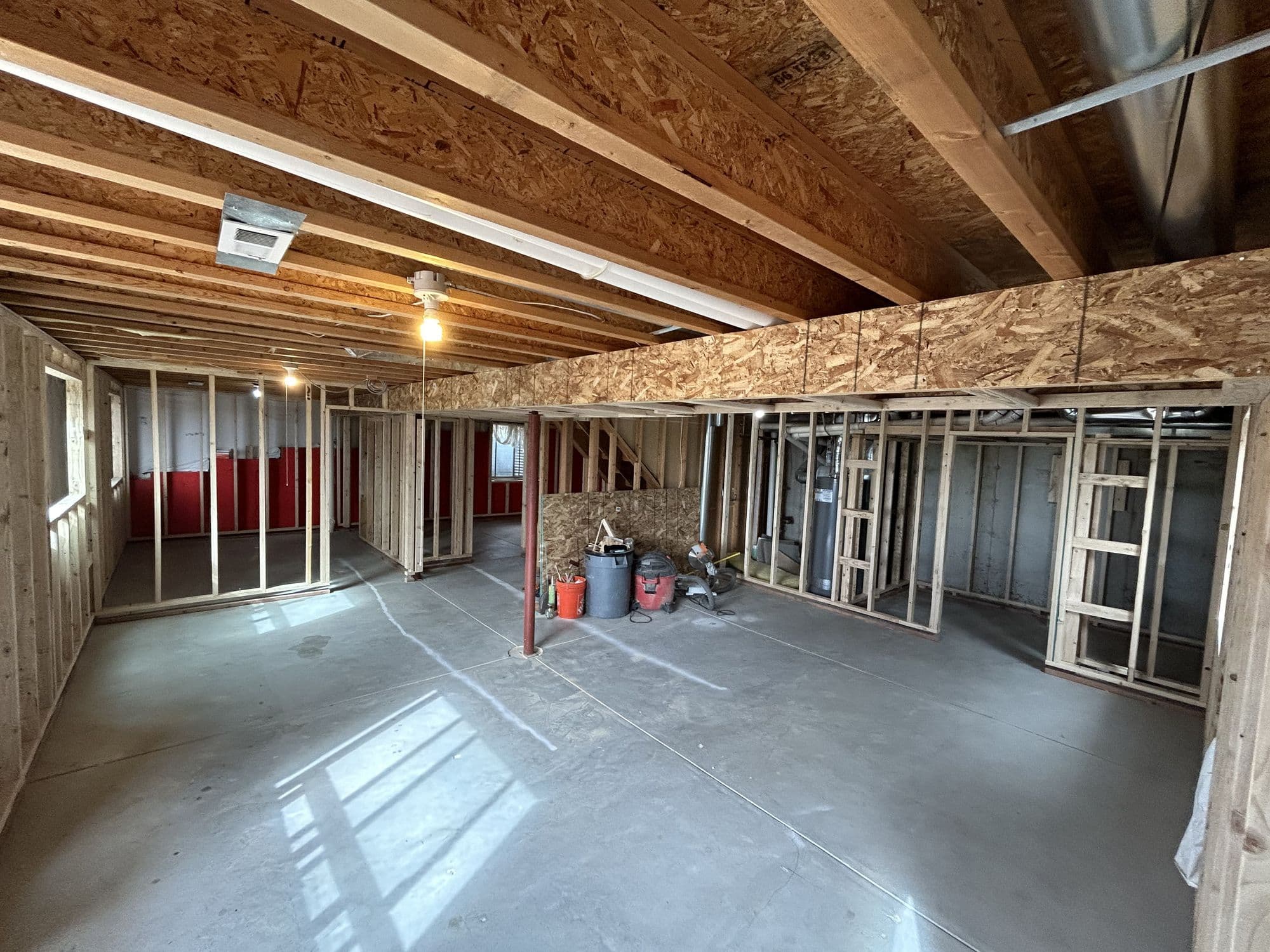 Basement framing in progress during a finish-out project