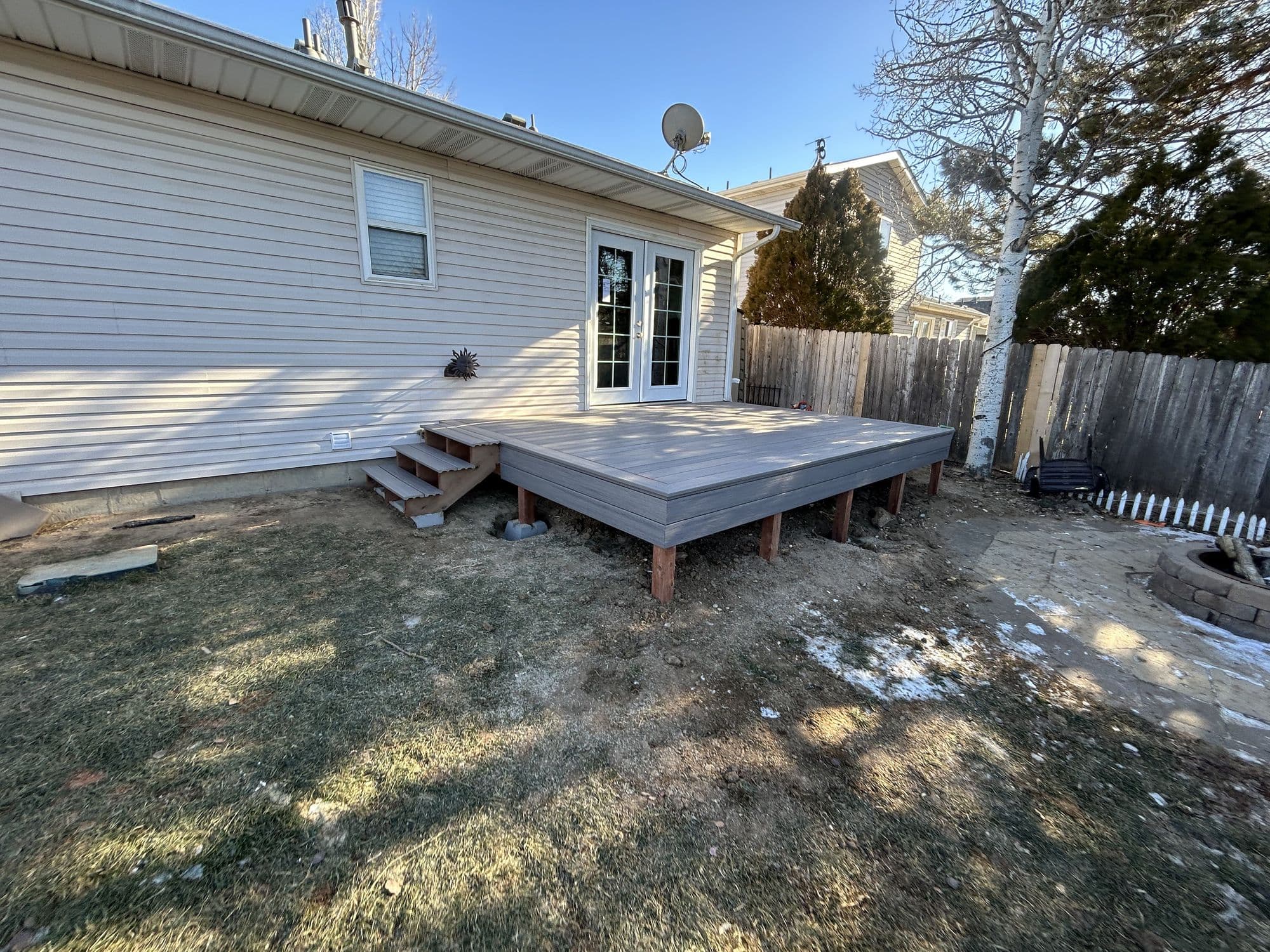 Finished deck with stairs down to the yard