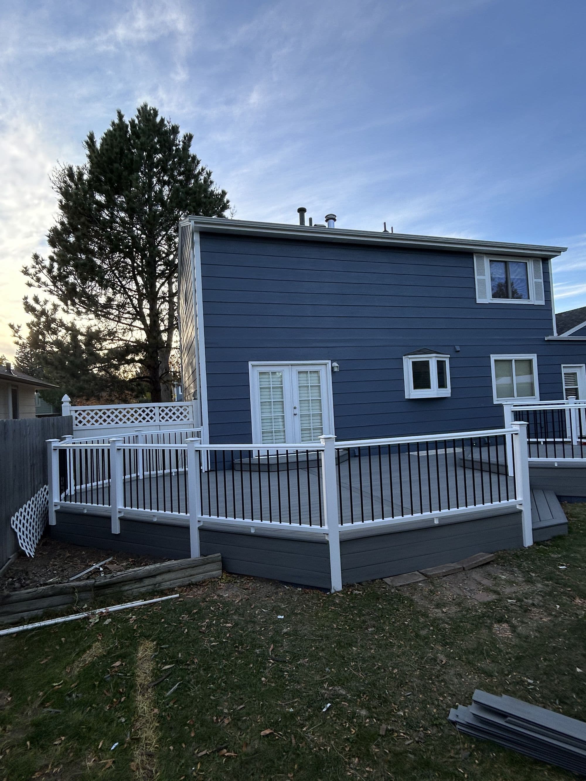 Deck rebuild in progress, new decking partially installed