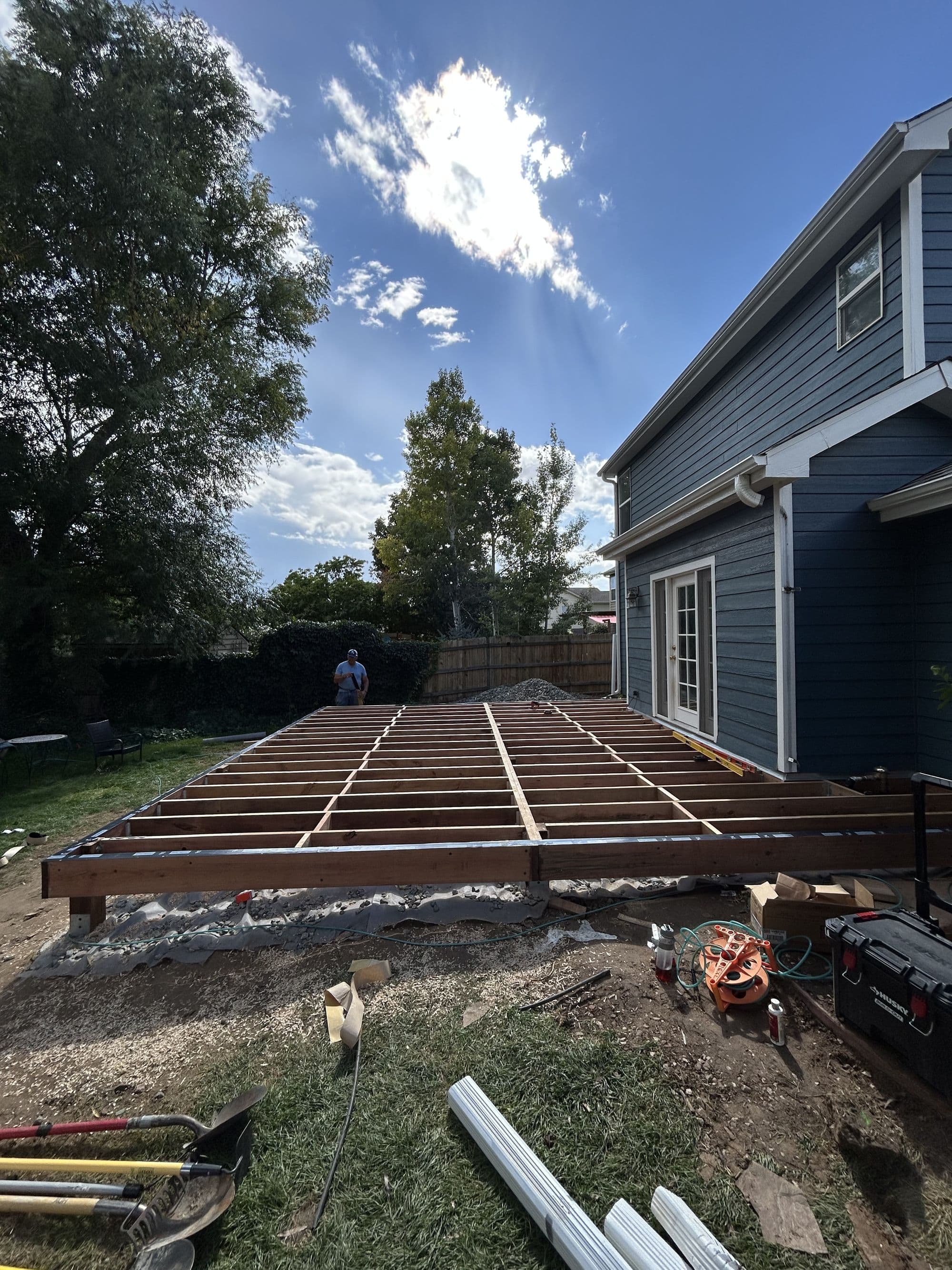 Joist framing underway for a large deck project
