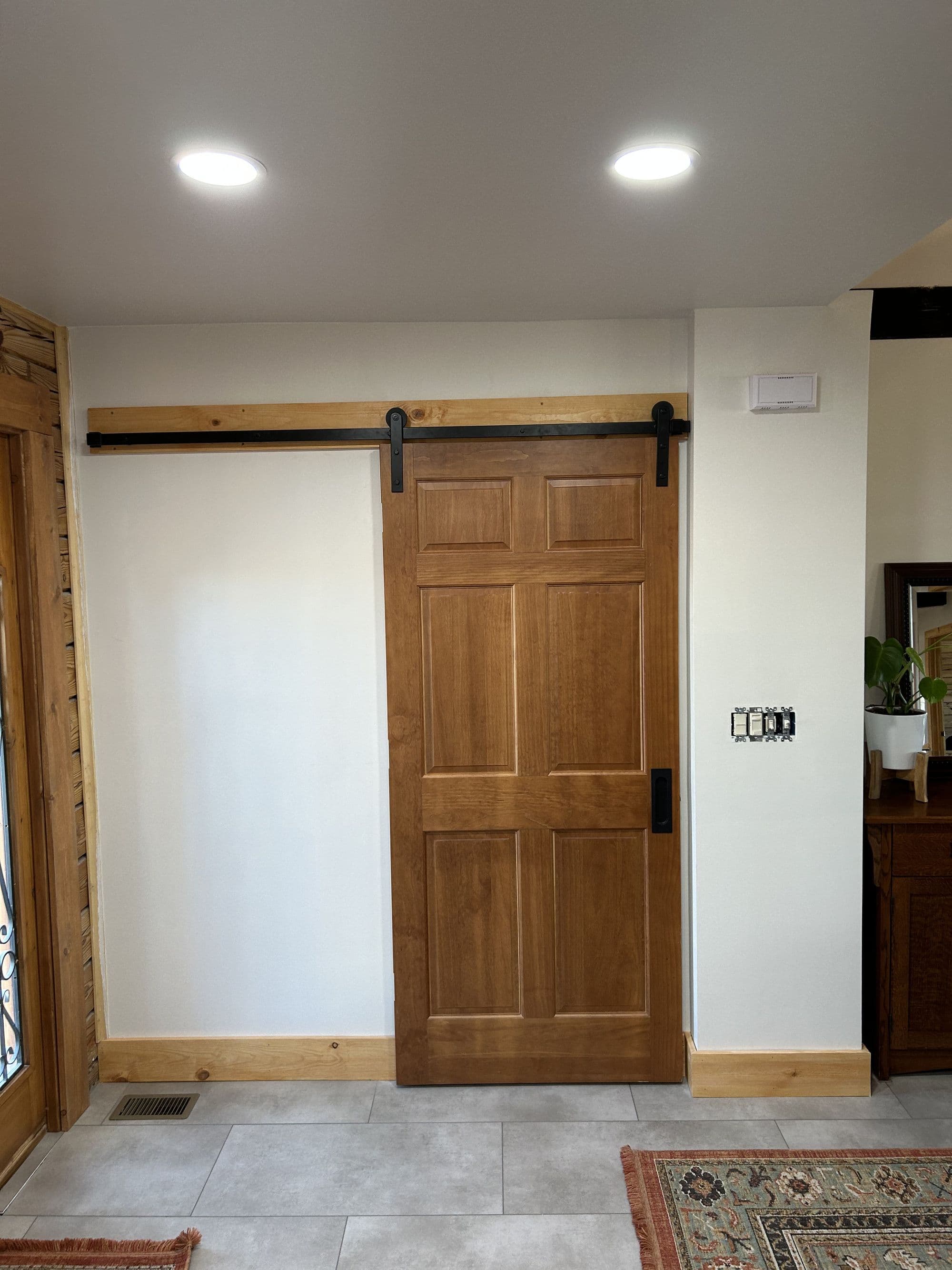 Finished sliding barn door, interior remodel detail