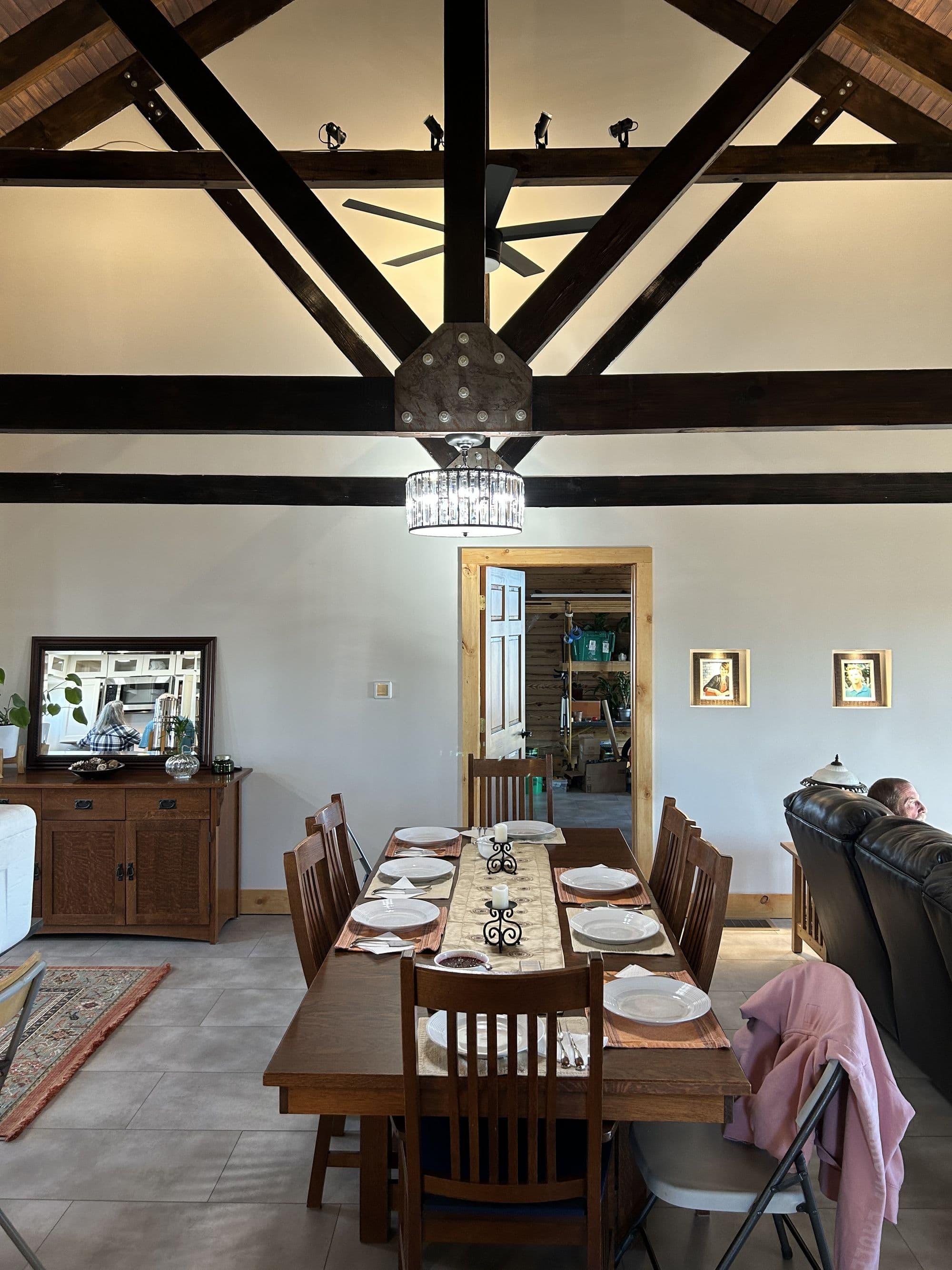 Finished dining and living area with vaulted timber ceiling